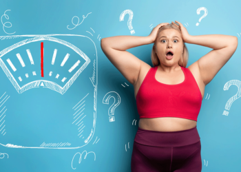 weight loss confusion, woman on scale, diet frustration, why am I not losing weight