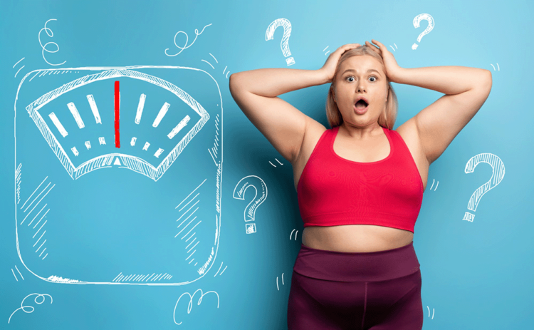 weight loss confusion, woman on scale, diet frustration, why am I not losing weight