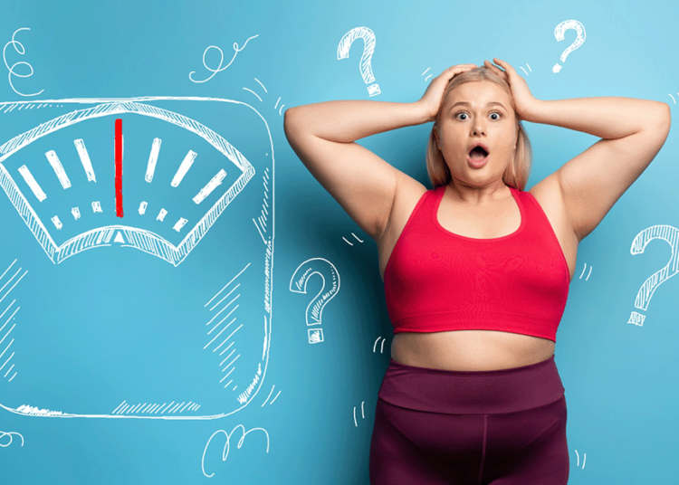 weight loss confusion, woman on scale, diet frustration, why am I not losing weight